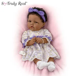 The Ashton-Drake Galleries So Truly Real All God's Grace in One Tiny Face Lifelike Baby Doll with A Cross Bracelet and Featuring A Purple-Accented Dress 20-inches