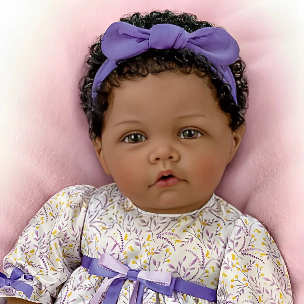 The Ashton-Drake Galleries So Truly Real All God's Grace in One Tiny Face Lifelike Baby Doll with A Cross Bracelet and Featuring A Purple-Accented Dress 20-inches